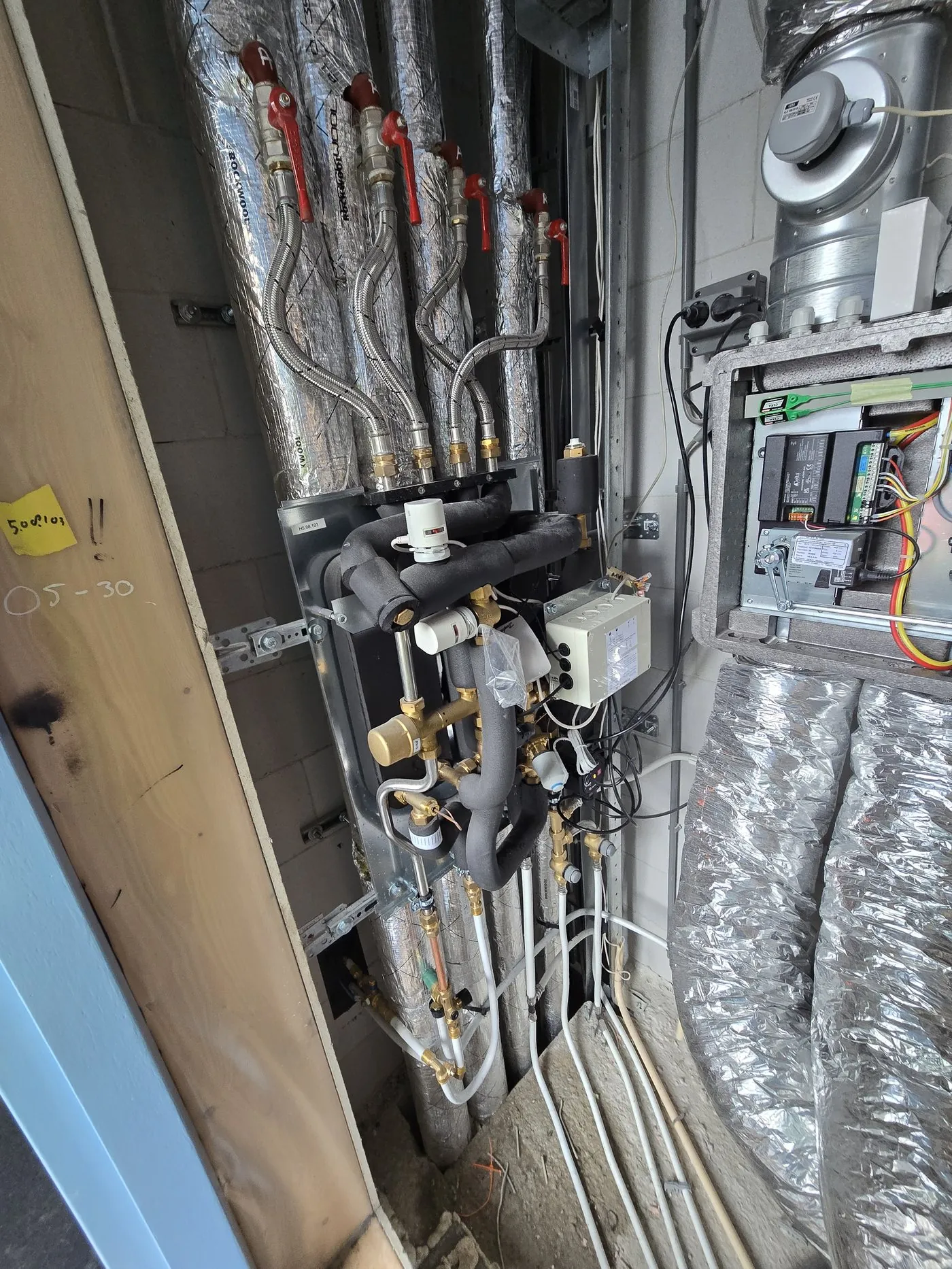 Technical connection with pipework and an electrical control cabinet