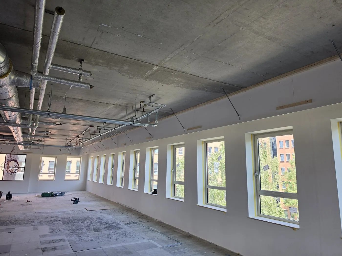 Installation work on the ceiling of the office floor