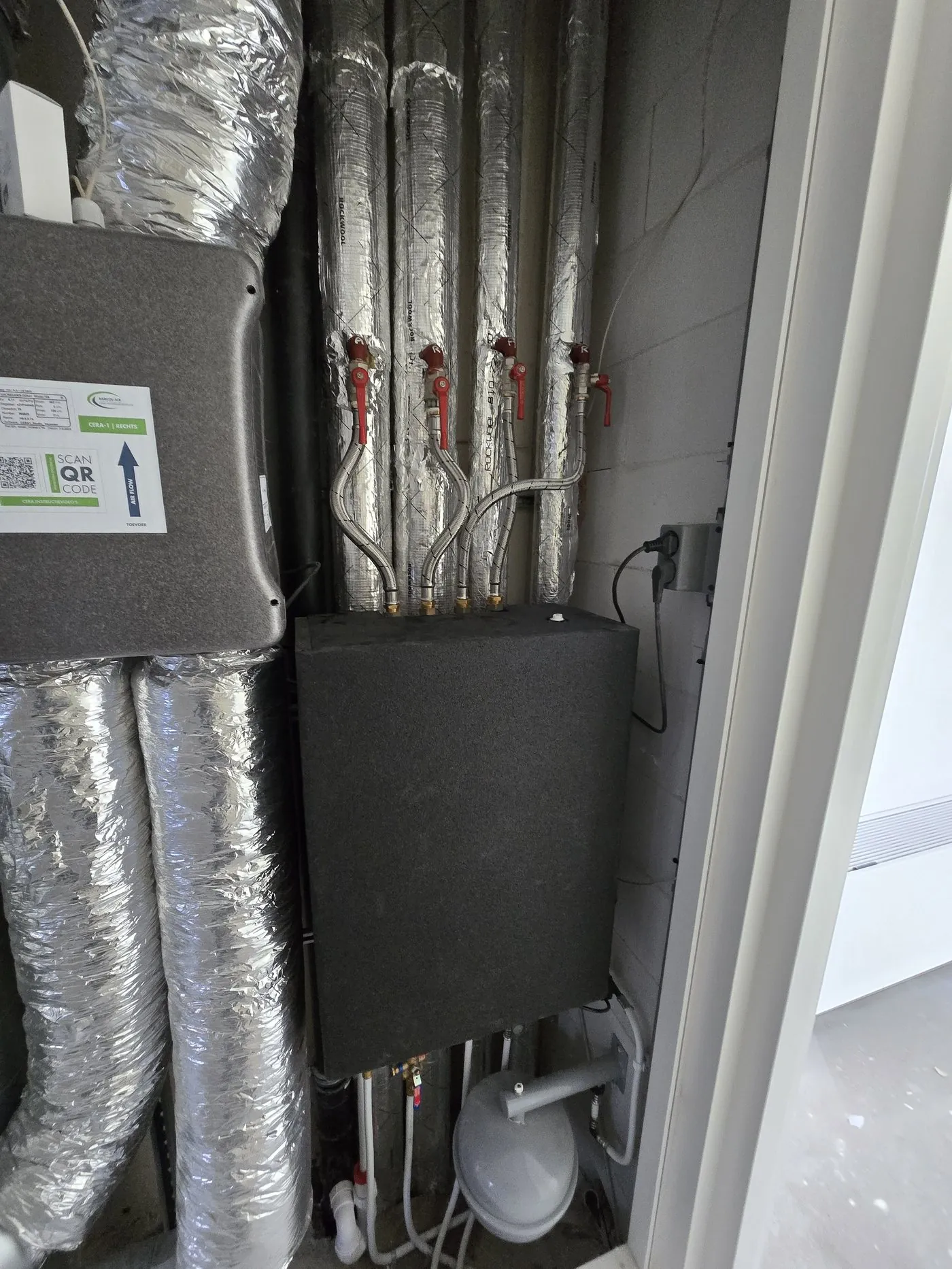 Detail of a technical connection cabinet with pipework